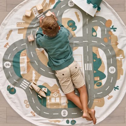 Toddlekind interactieve speelmat met opbergzak desert city sfeerfoto met jongen